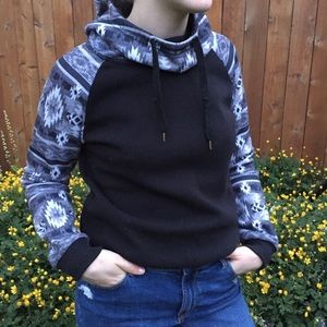 Black hoodie with patterned sleeves and hood